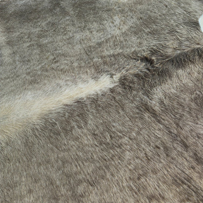 Tapete de couro de boi Champagne CH879 — detalhe do acabamento artesanal