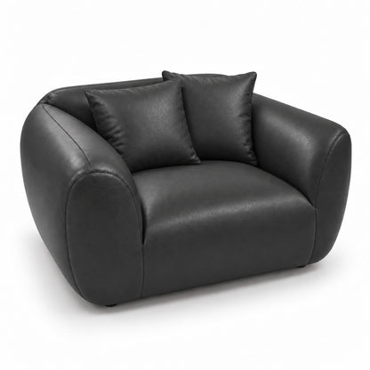 Poltrona Ventura Preto Grafite em Couro Naturale Premium — uma poltrona com duas almofadas